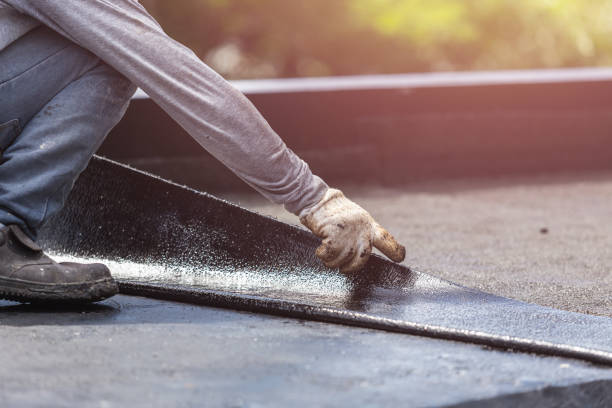 Professional Emergency Waterproofing technician working in Riley, IN
